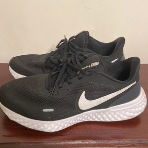 Nike Men’s Revolution Black and White Sneakers. Make an offer!